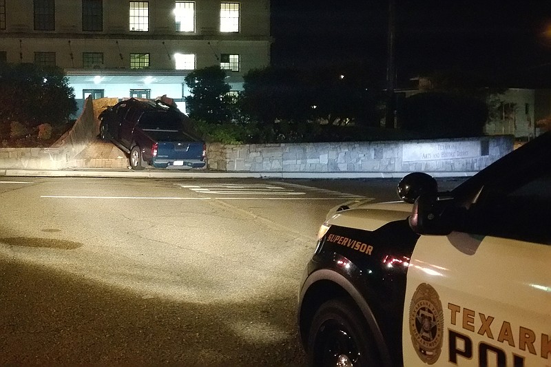 A man driving southbound on State Line Avenue early Tuesday morning, July 26, 2016 failed to turn right and crashed into the fountain behind the Downtown Post Office, Texarkana, Texas, police officers said. People playing Pokémon Go nearby said "it sounded like a train wreck" when the blue Nissan Frontier struck the brick fountain. The driver and a passenger were taken to a local hospital with unknown injuries, police said.