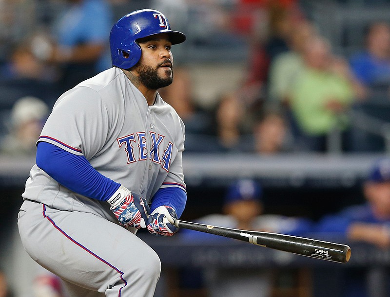 In this Tuesday, June 28, 2016 file photo Texas Rangers' Prince Fielder watches his eighth-inning RBI double during a baseball game against the New York Yankees in New York.  Texas Rangers slugger Prince Fielder is facing the prospect of season-ending neck surgery after an MRI revealed a herniated disk just above an area that was repaired two years ago, Wednesday, July 20, 2016. 