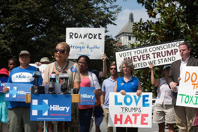 Anita Price, vice-mayor of Roanoke, Va., addresses the media and supporters during a news conference at the Wells Avenue Plaza to reject Republican presidential nominee Donald Trump and to support Democratic presidential candidate Hillary Clinton, Monday, July 25, 2016, in Roanoke. 