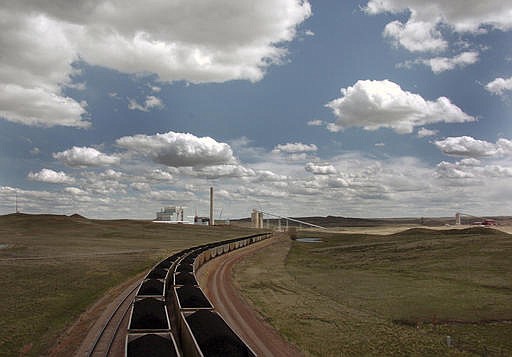 In this Thursday, April 29, 2010 file photo, a pair of coal trains idle on the tracks near Dry Fork Station, a coal-fired power plant being built by the Basin Electric Power Cooperative near Gillette, Wyo.