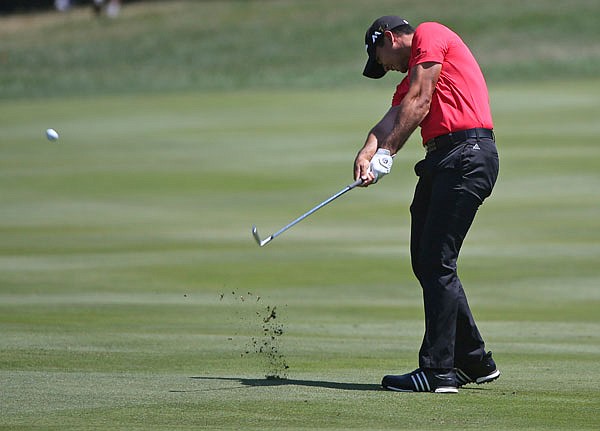 Jason Day hits his approach shot on the fifth hole during a practice round Wednesday for the PGA Championship at Baltusrol Golf Club in Springfield, N.J.