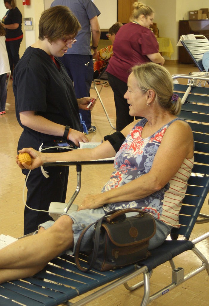 Susan Groves, of Fulton, prepares to donate blood.