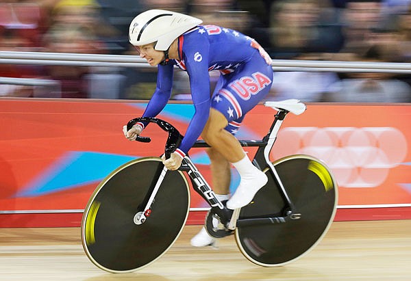 In this Aug. 6, 2012, file photo, Sarah Hammer of the United States, competes in the women's omnium flying lap event at the 2012 Summer Olympics in London.