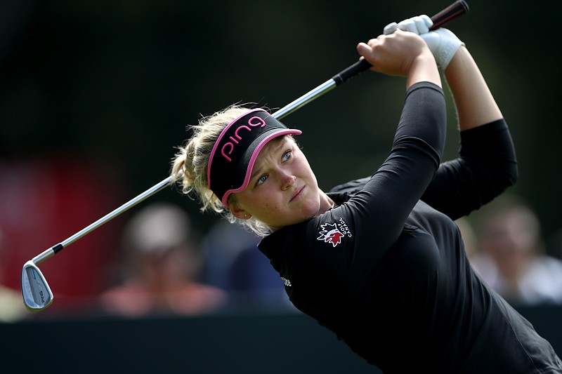 Canada's Brooke Henderson plays a shot during day one of the  Women's British Open at Woburn Golf Club, Woburn England Thursday July 28, 2016.