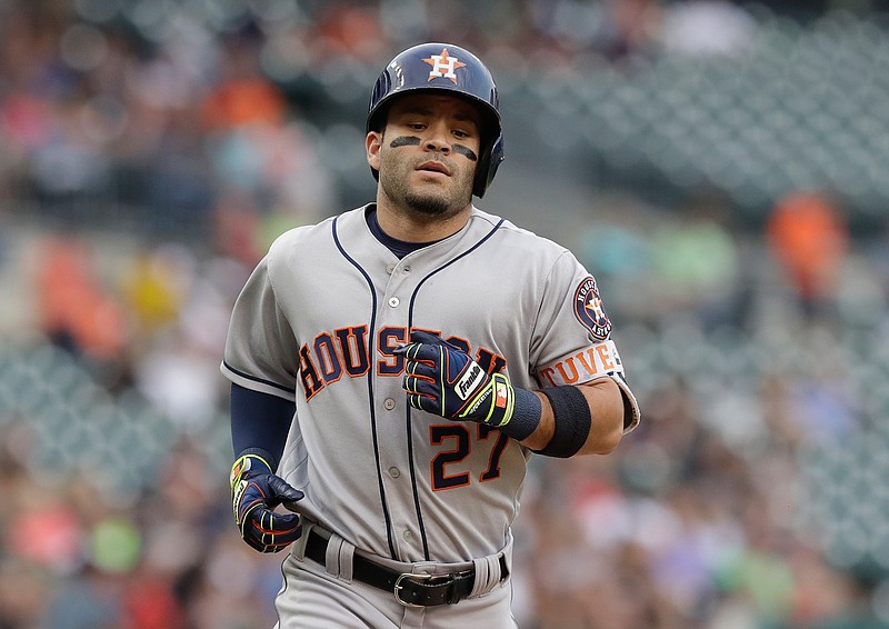 Houston Astros' Jose Altuve rounds the bases after a two-run home run during the first inning of a baseball game against the Detroit Tigers, Friday, July 29, 2016, in Detroit. 