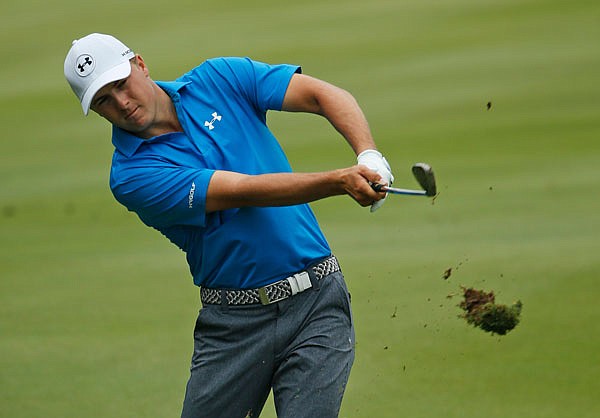 Jordan Spieth follows through on his approach shot on the 17th hole during Friday's second round of the PGA Championship at Baltusrol Golf Club in Springfield, N.J.