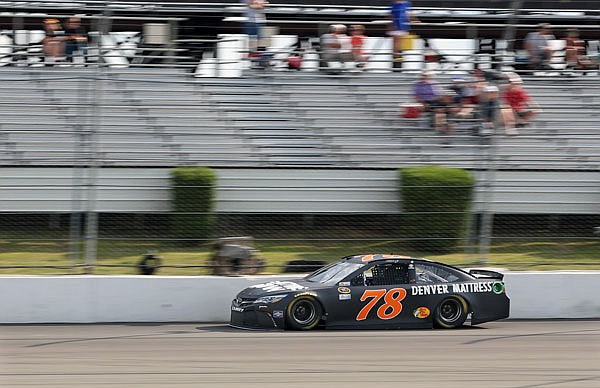 Martin Truex Jr. drives Friday at Pocono Raceway during qualifying for Sunday's NASCAR Sprint Cup Series Pennsylvania 400 in Long Pond, Pa. Truex qualified on the pole. 