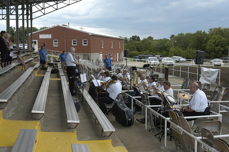 In this August 2016 photo, the California Community Ensemble performs the "Star Spangled-Banner" to begin the half hour concert prior to the 50th Moniteau County Fair Vespers Service.