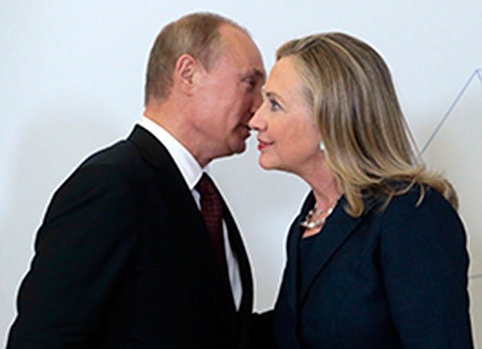 Russian President Vladimir Putin meets with then-Secretary of State Hillary Clinton in 2012 at Vladivostok, Russia. Clinton says as president she will stand up to Putin. As secretary of state, her wrangles with Russia had mixed results. Clinton, the public face of President Barack Obama's first-term "reset" policy with Russia, scored a number of diplomatic successes — when Dmitry Medvedev was president. When Putin reclaimed the presidency, it was a different story. 