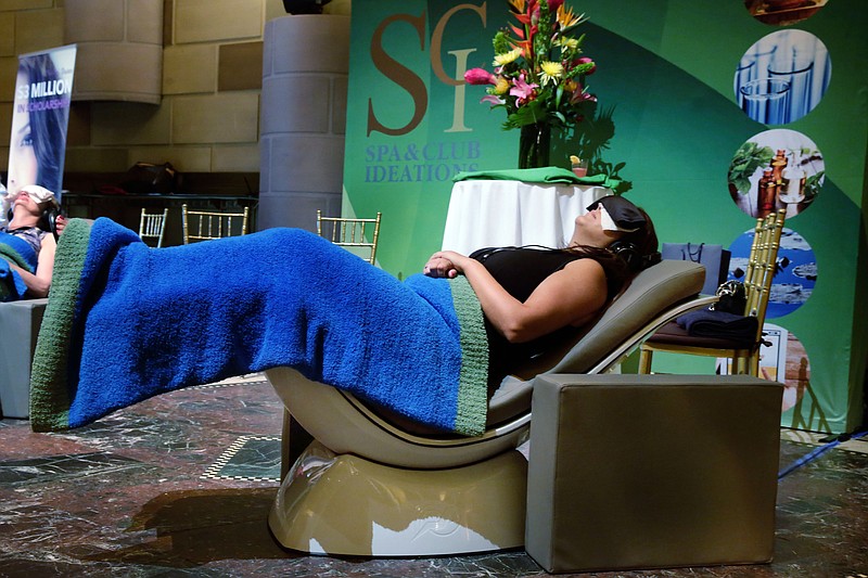 In this July 27, 2016 photo, the SolTec Lounge, from Spa & Club Ideations of Las Vegas, is demonstrated at the annual International SPA Association event, in New York. 