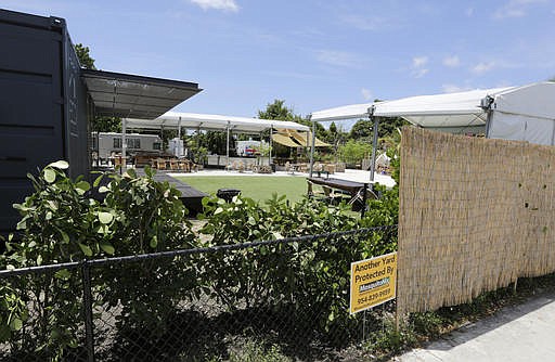 A view of the outdoor business The Wynwood Yard that has been closed since last Aug. 2, due to the cases of Zika in the area, Friday, Aug. 5, 2016, in the Wynwood area of Miami. Thank goodness it's the slow season in Florida. At least that's what officials and representatives of the state's $82 billion tourism industry are thinking in the wake of news that 15 people were infected with Zika in one small, trendy neighborhood in Miami. 