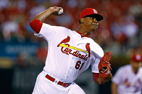Cardinals reliever Alex Reyes, making his major league debut, pitches during the ninth inning of Tuesday night's game against the Cincinnati Reds in St. Louis.