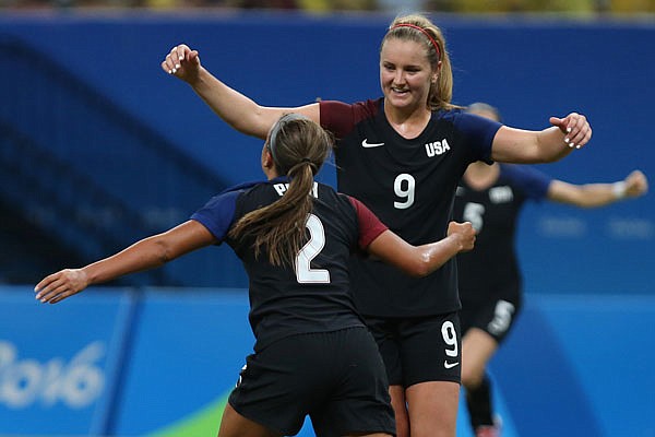 United States' Mallory Pugh (left) is congratulated after scoring her team's second goal by teammate Lindsey Horan during a group G match Tuesday of the women's Olympic soccer tournament between Colombia and United States at the Arena Amazonia stadium in Manaus, Brazil.