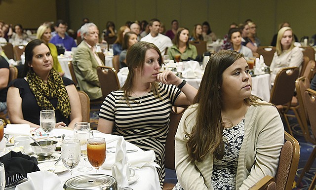 Erin Barber, right, joined fellow new Jefferson City High School English teachers, Lynsey Sartain, middle, and Angie Green, as more than 100 new area teachers were introduced at a luncheon Wednesday, Aug. 10, 2016, hosted by the Jefferson City Rotary Club at Capital Plaza Hotel. After an individual introduction, they were addressed by Missouri Commissioner of Education Margie Vandeven.