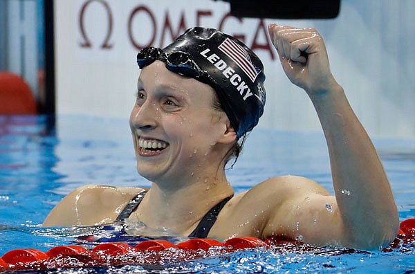 Katie Ledecky of the United States celebrates after winning gold in the women's 800-meter freestyle final Friday in Rio de Janeiro.