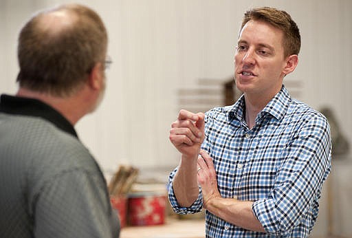Missouri Secretary of State Jason Kander, right, a Democrat challenging incumbent Republican U.S. Senator Roy Blunt, talks with International Union of Painters and Allied Trades District 58 instructor Kevin Harned during a tour of the IUPAT training facility in the St. Louis suburb of Chesterfield, Mo. Friday, Aug. 12, 2016.