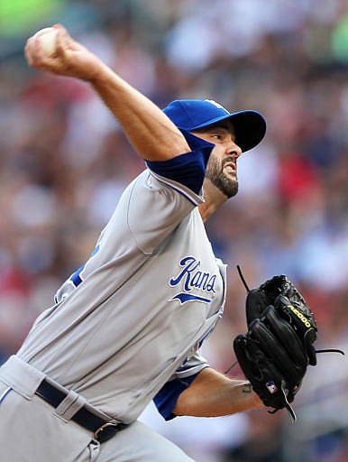 Kansas City Royals starting pitcher Dillon Gee throws to the Minnesota Twins in the first inning of a baseball game on Saturday, Aug., 13, 2016, in Minneapolis.