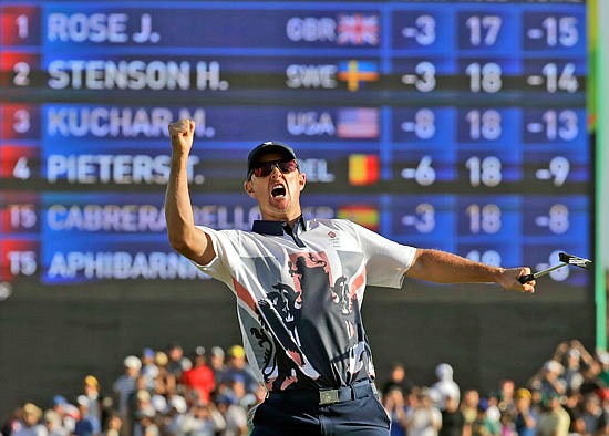 Justin Rose of Great Britain celebrates Sunday after winning the men's golf gold medal at the Summer Olympics in Rio de Janeiro.