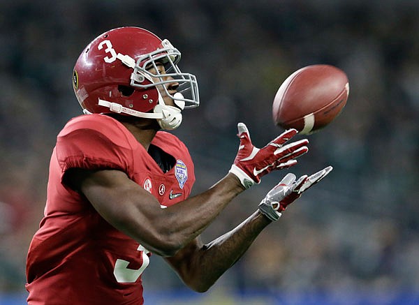 In this Dec. 31 file photo, Alabama wide receiver Calvin Ridley makes a touchdown reception against Michigan State during the second half of the Cotton Bowl semifinal playoff game in Arlington, Texas.