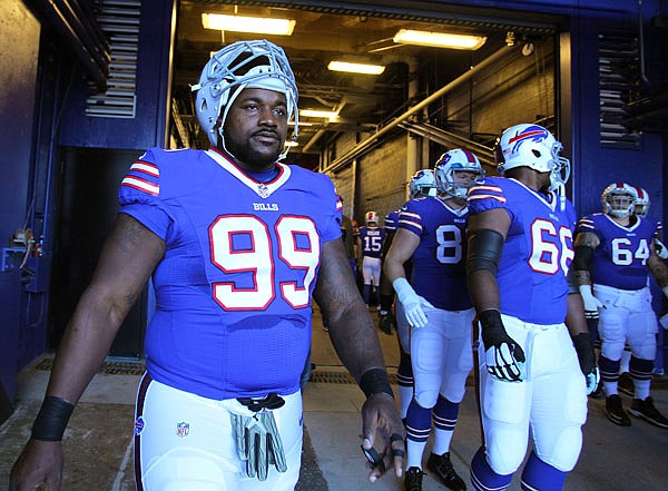 In this Nov. 8 file photo, Bills defensive tackle Marcell Dareus heads to the field before playing the Dolphins in a game in Orchard Park, N.Y. The NFL has suspended Dareus for the first four games of the season for violating the league's substance abuse policy.