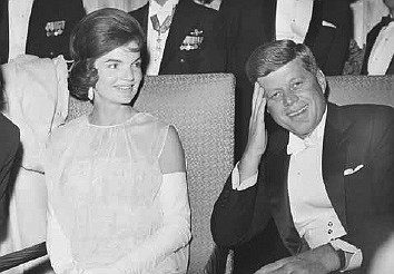 President John F. Kennedy and first lady Jacqueline Kennedy
are seated in January 1961 as they attend one of
five inaugural balls in Washington, D.C. A new documentary, "JFK: Fact and Fable," examines the role the late Jacqueline Kennedy Onassis played in shaping President John F. Kennedy's public persona.