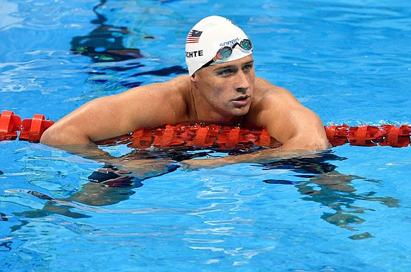 In this Aug. 9 file photo, United States swimmer Ryan Lochte checks his time after a men's 4x200-meter freestyle relay heat during the Summer Olympics in Rio de Janeiro.