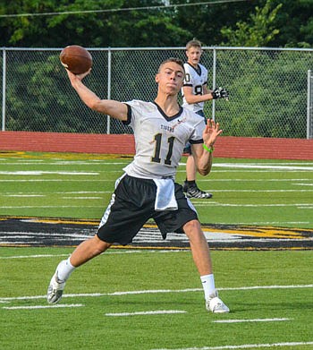 David Connor brings experience at quarterback for Versailles this season.