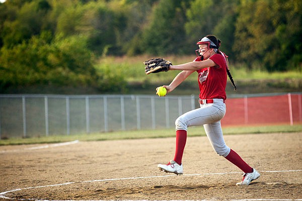 Calvary pitcher Haley Braun begins her windup Thursday during the Lady Lions' matchup with Russellville at Calvary.