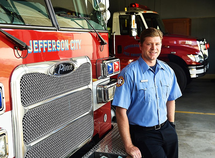 Jefferson City firefighter Sean Henning poses at Station 2.