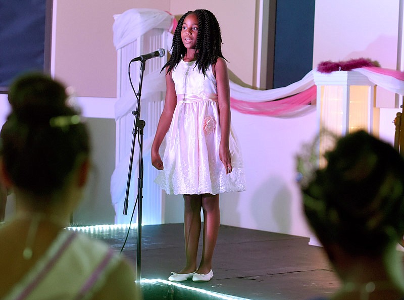 Sierra Young, 10, speaks Saturday, Aug. 20, 2016 during the oratory portion at the third annual Miss Divine Destiny Pageant at Lincoln University in Jefferson City. Young said she gets nervous on stage and hopes to become a professional singer