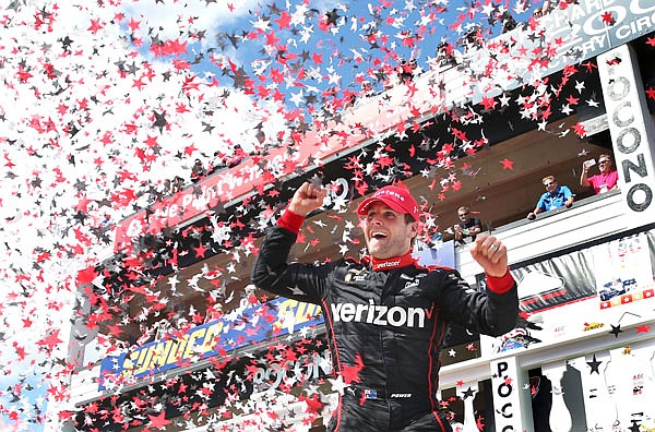 Will Power celebrates in Victory Lane after winning Monday's ABC Supply 500 at Pocono Raceway Long Pond, Pa.