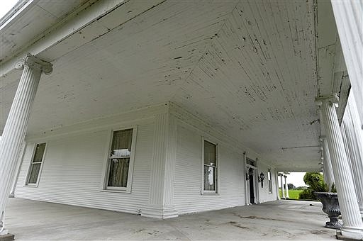 The wraparound porch at Rose Hill Manor is shown on Aug. 12 in Port Arthur, Texas.  
