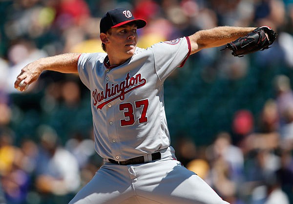 Nationals starting pitcher Stephen Strasburg delivers a pitch to the Rockies' Charlie Blackmon in the first second inning of an Aug. 17 game in Denver.