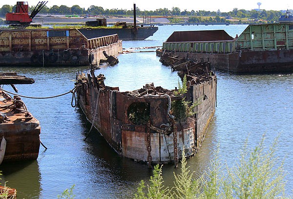 Rusting remnants of an old Russian submarine that once was used as a floating museum until it sank in 2007 remains in the Providence river in Providence, Rhode Island. The state wants it gone. 