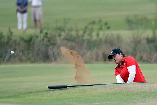 South Korea's Inbee Park hits from a bunker on the 18th hole Saturday during the final round of the women's golf tournament at the Summer Olympics in Rio de Janeiro.