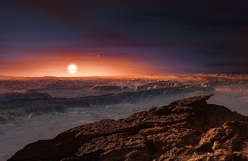 This artist rendering provided by the European Southern Observatory shows a view of the surface of the planet Proxima b orbiting the red dwarf star Proxima Centauri, the closest star to the Solar System. The double star Alpha Centauri AB also appears in the image to the upper-right of Proxima itself. Proxima b is a little more massive than the Earth and orbits in the habitable zone around Proxima Centauri, where the temperature is suitable for liquid water to exist on its surface. 