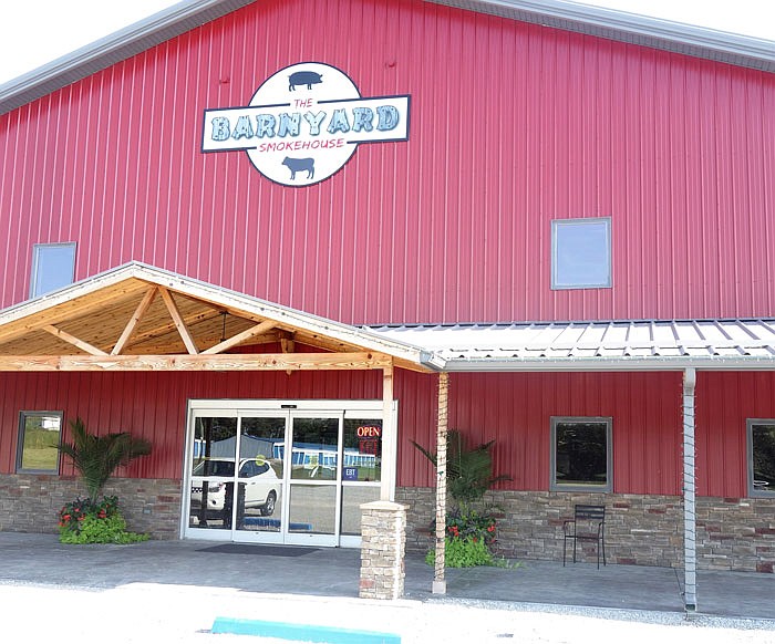 The Barnyard Smokehouse is the new restaurant opening next to Central Missouri Meat & Sausage.