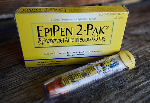 This Oct. 10, 2013, file photo, shows an EpiPen epinephrine auto-injector, a Mylan product, in Hendersonville, Texas. 