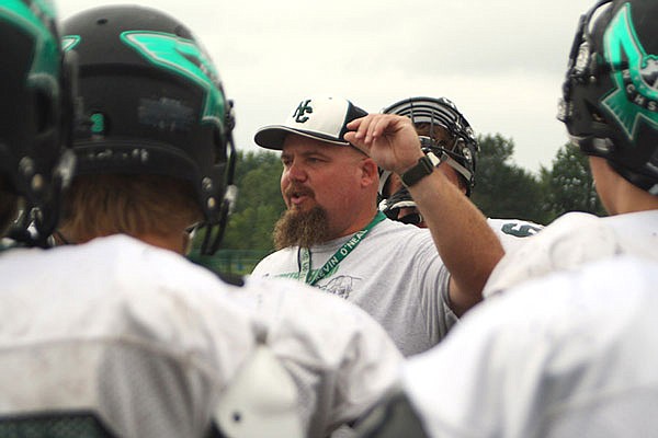 North Callaway head coach Kevin O'Neal talks to his players before a preseason practice earlier this summer. O'Neal is beginning his third season with the Thunderbirds.