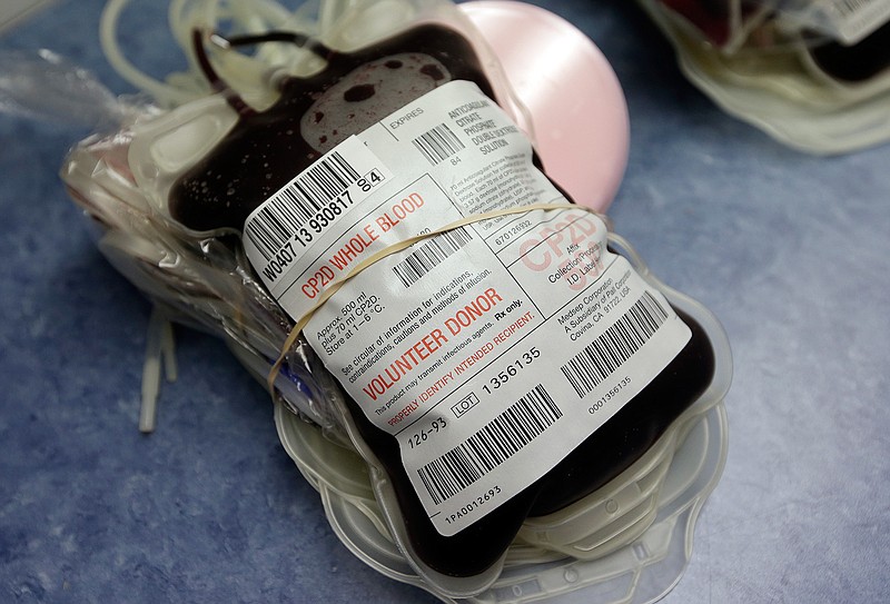 This Aug. 20, 2013 file photo shows blood donated in Indianapolis. On Friday, Aug. 26, 2016, the Food and Drug Administration recommended that all U.S. blood banks start screening for the Zika virus, a major expansion intended to protect the nation's blood supply from the mosquito-borne disease.