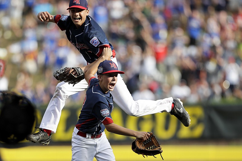 Endwell, N.Y.'s Michael Mancini, right, and Jude Abbadessa celebrate after winning the United States championship baseball game against Goodlettsville, Tenn. at the Little League World Series, Saturday, Aug. 27, 2016, in South Williamsport, Pa. Endwell, N.Y. won 4-2 and is scheduled to play South Korea in the World Series tomorrow.