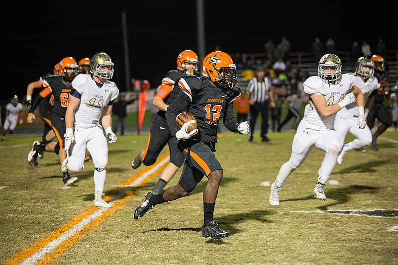 Nashville's Darius Hopkins runs for a touchdown against Shiloh Christian on Nov. 20, 2015,  in Nashville, Ark. The Scrappers begin the season as Class 4A's No. 1-ranked team in the Associated Press' Arkansas preseason poll. 