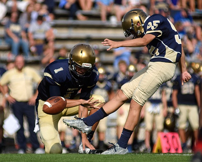 Helias kicker Vito Calvaruso boots an extra point through the uprights Saturday against Kansas City Southeast at Adkins Stadium in Jefferson city. Calvaruso made 4-of-5 extra-point attempts against the Knights.