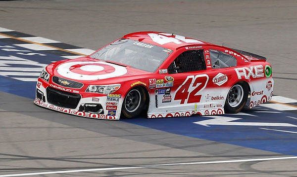 Kyle Larson crosses the finish line to win the Pure Michigan 400 Sprint Cup Series race Sunday at Michigan International Speedway in Brooklyn, Mich.