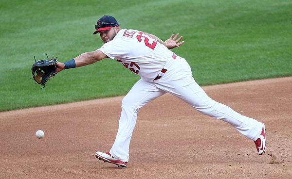 Cardinals third baseman Jhonny Peralta is unable to reach a double down the left field line by the Athletics' Ryon Healy in the third inning of Sunday afternoon's game at Busch Stadium in St. Louis.