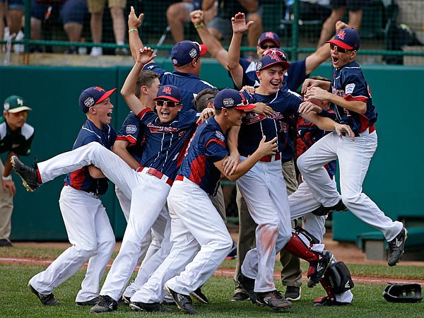 Endwell, N.Y., celebrates its 2-1 victory against South Korea on Sunday in the Little League World Series championship game at Lamade Stadium in South Williamsport, Pa.