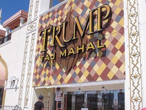 A worker carries out repairs to a facade of the Trump Taj Mahal casino in Atlantic City, N.J. Owner Carl Icahn says he will close the casino after Labor Day.
