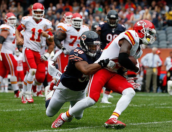 Bears outside linebacker Jonathan Anderson tackles Chiefs wide receiver Jeremy Maclin during the first half of Saturday's preseason game in Chicago.