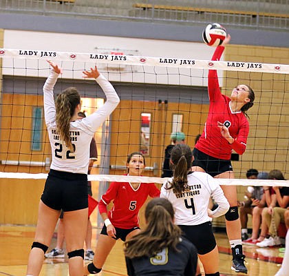 Jason Strickland/
News Tribune
Maddi Stone of the Jefferson City Lady Jays goes up for a kill during Monday night's vollebyall match against the Sedalia Smith-Cotton Lady Tigers at Fleming Fieldhouse.