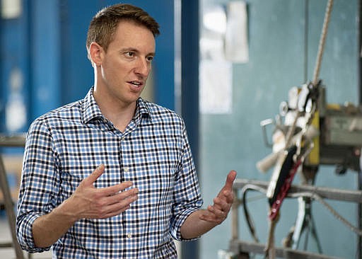  In this Aug. 12, 2016 file photo, Missouri Secretary of State Jason Kander, a Democratic candidate for the U.S. Senate, tours the International Union of Painters and Allied Trades training facility in Chesterfield, Mo. On election day a decade ago, Army Lt. Jason Kander was serving as an intelligence officer in Afghanistan. Today, he is touting his military service as a component in his campaign in his run to unseat incumbent Republican U.S. Sen. Roy Blunt in the November election.